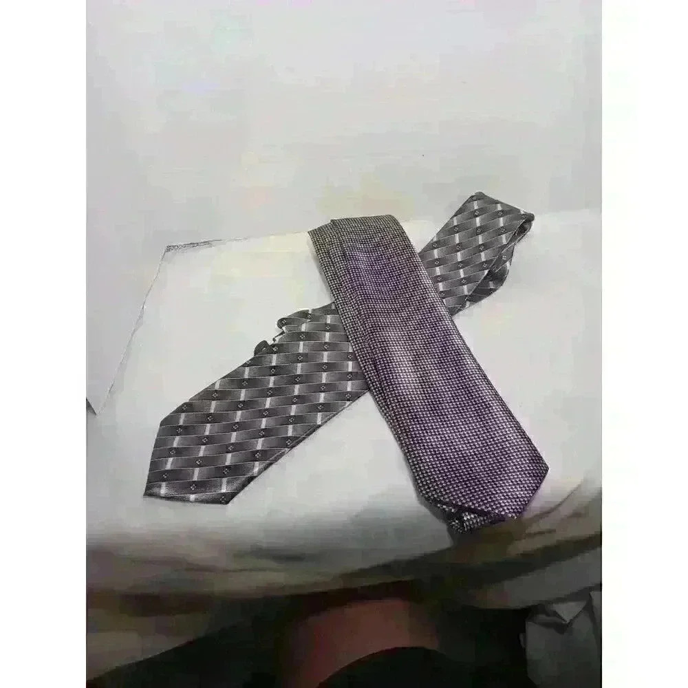 2 Robert Scott Adams ties New‎